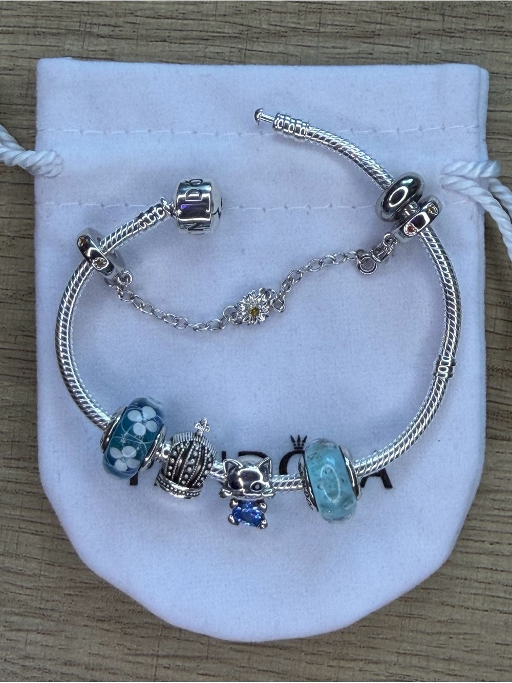 Silver Charm Bracelet with Blue Glass Beads and Cat Charm